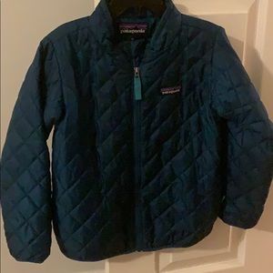 Teal colored Patagonia jacket, quilted.